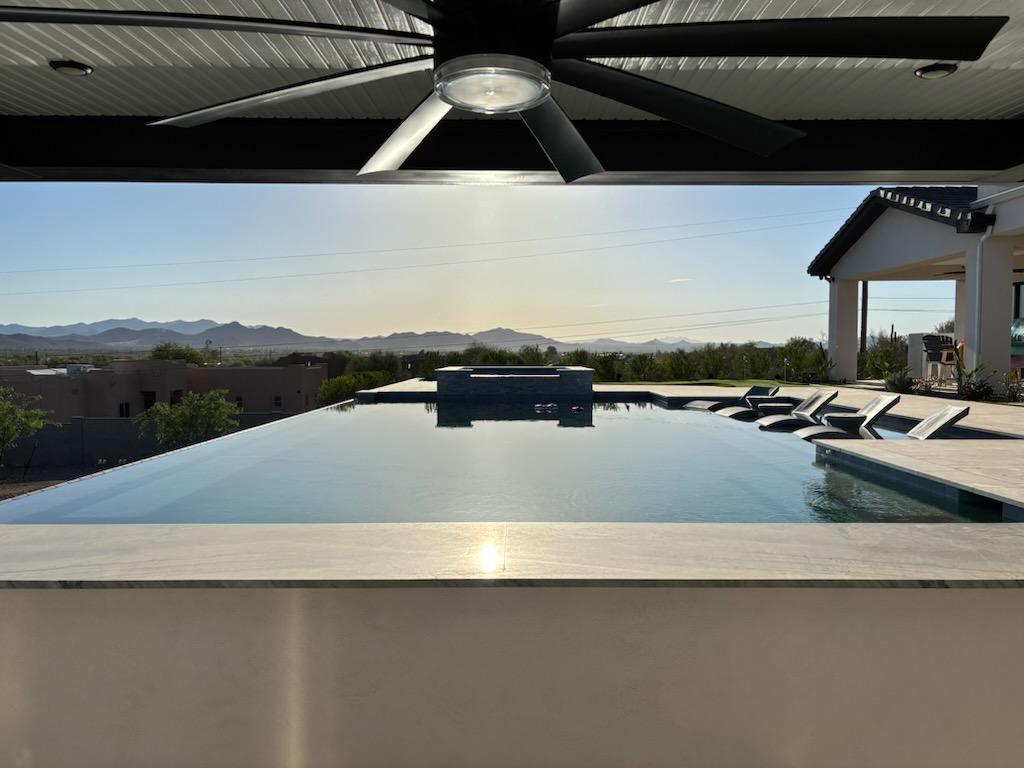 Infinity edge pool with valley views by DCM Pools — North Scottsdale, Arizona
