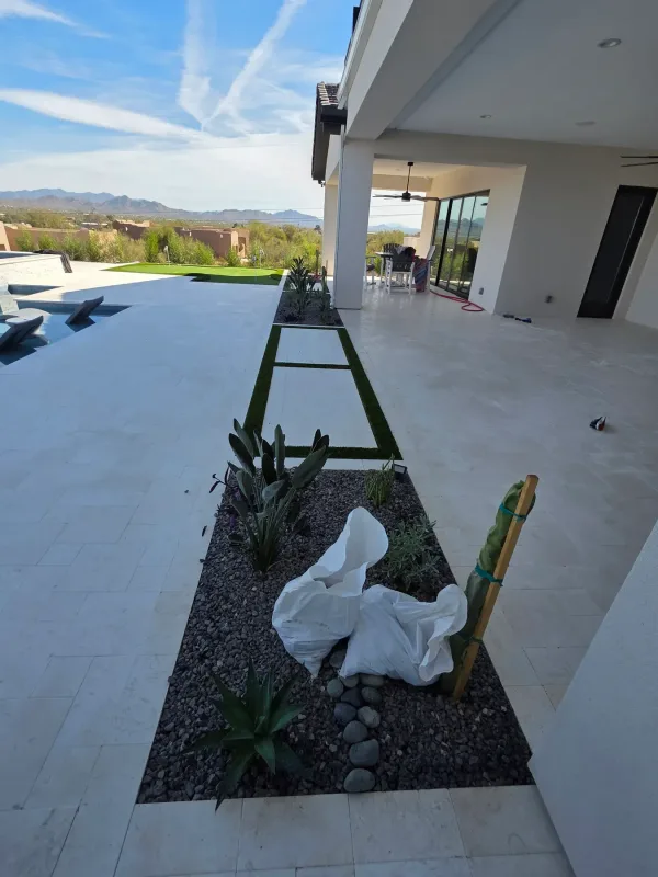 Paver patio with outdoor kitchen — DCM Pools and Construction