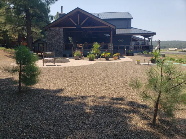 Paver patio with outdoor kitchen — DCM Pools and Construction