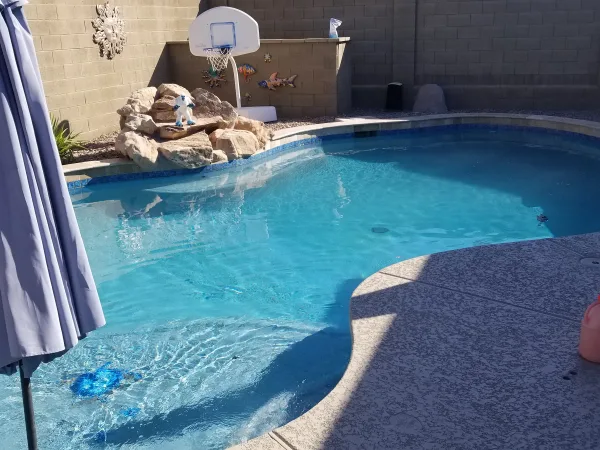 Custom pool with paver deck — DCM Pools Arizona
