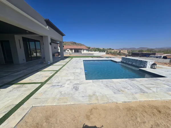 Pool with travertine coping — DCM Pools and Construction