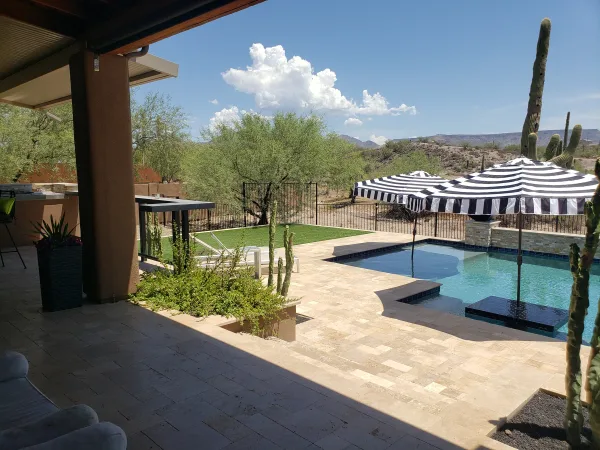 Pool with spa and travertine deck — DCM Pools Arizona