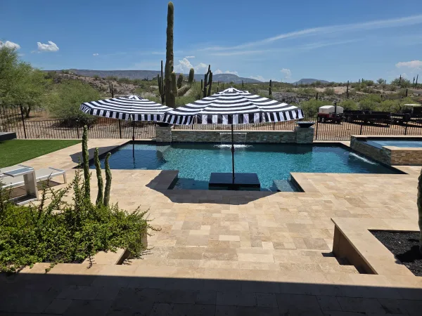 Pool with travertine coping — DCM Pools and Construction